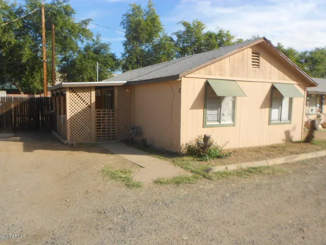 a view of backyard of house