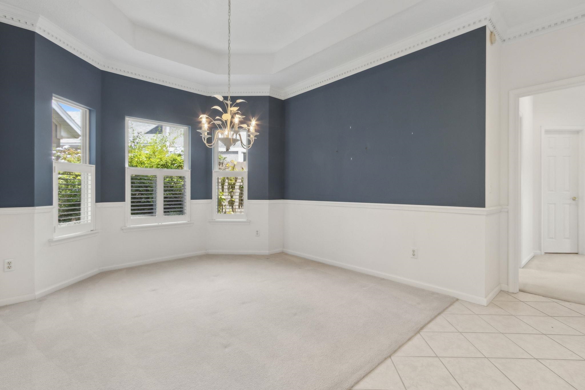 908 Birdie Way St. Augustine, FL 32080 - Photo 12 of 68 a view of an empty room with window