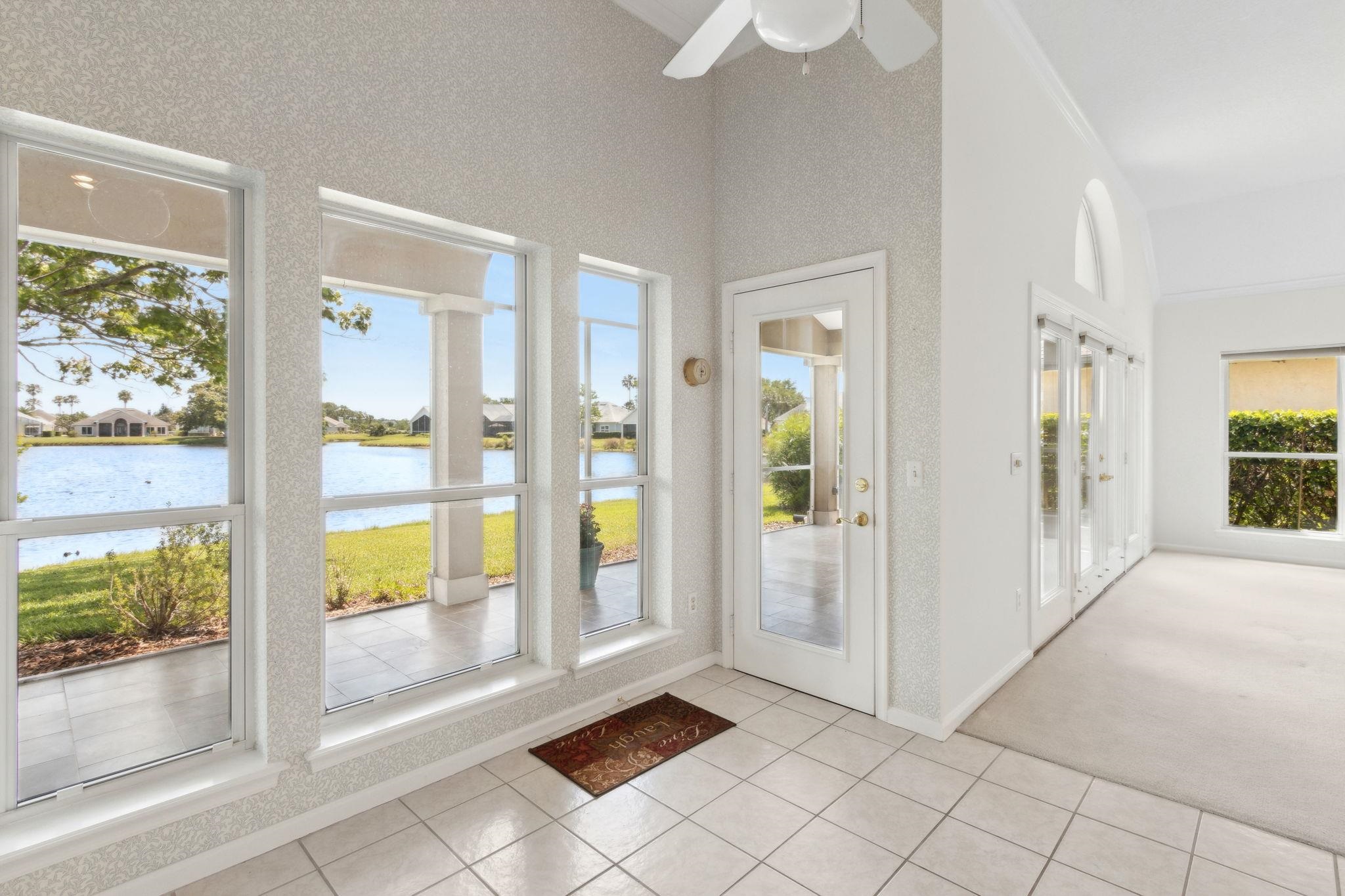 908 Birdie Way St. Augustine, FL 32080 - Photo 23 of 68 a view of an entryway with wooden floor