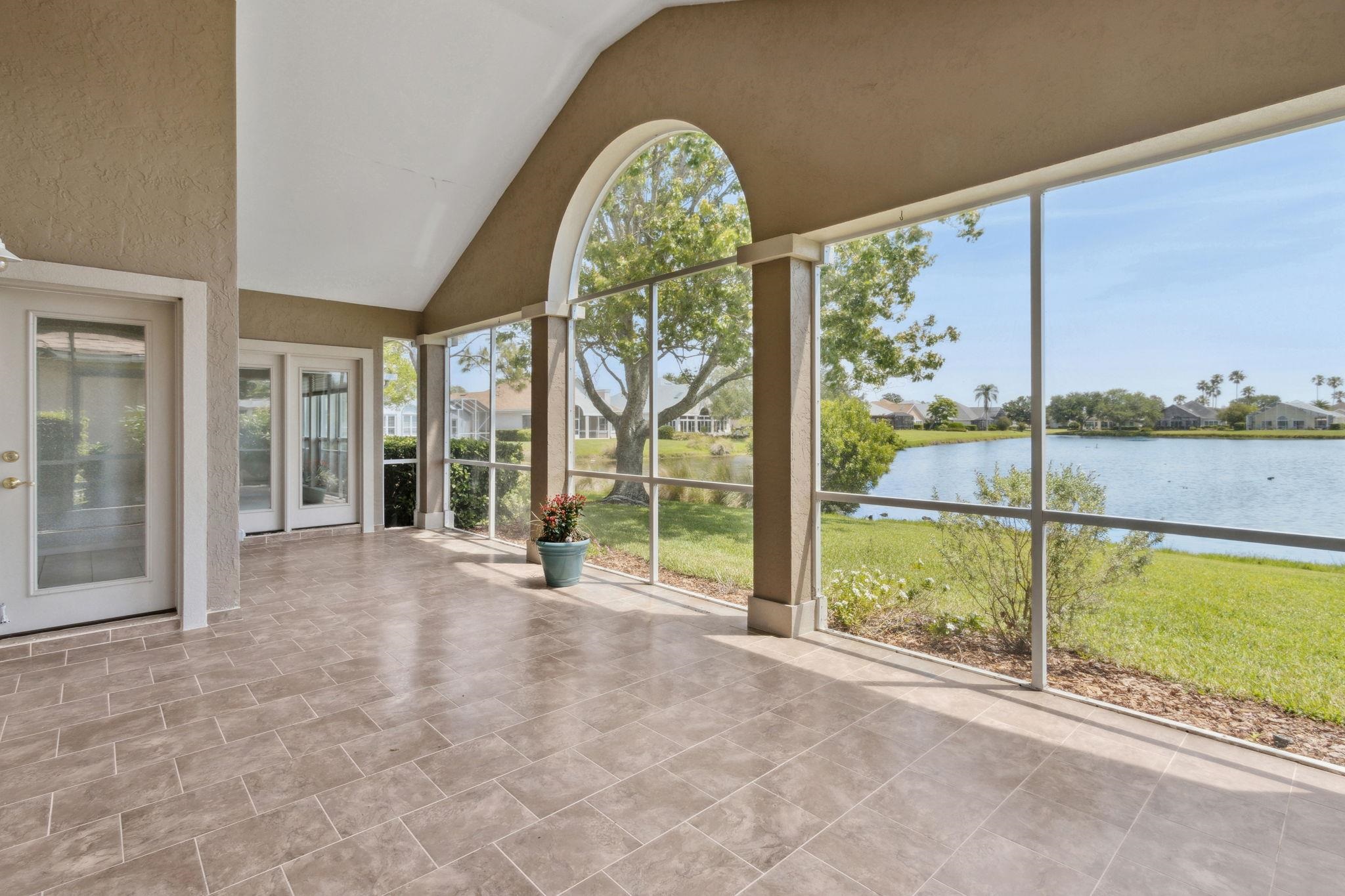 908 Birdie Way St. Augustine, FL 32080 - Photo 29 of 68 a view of an entryway with a garden