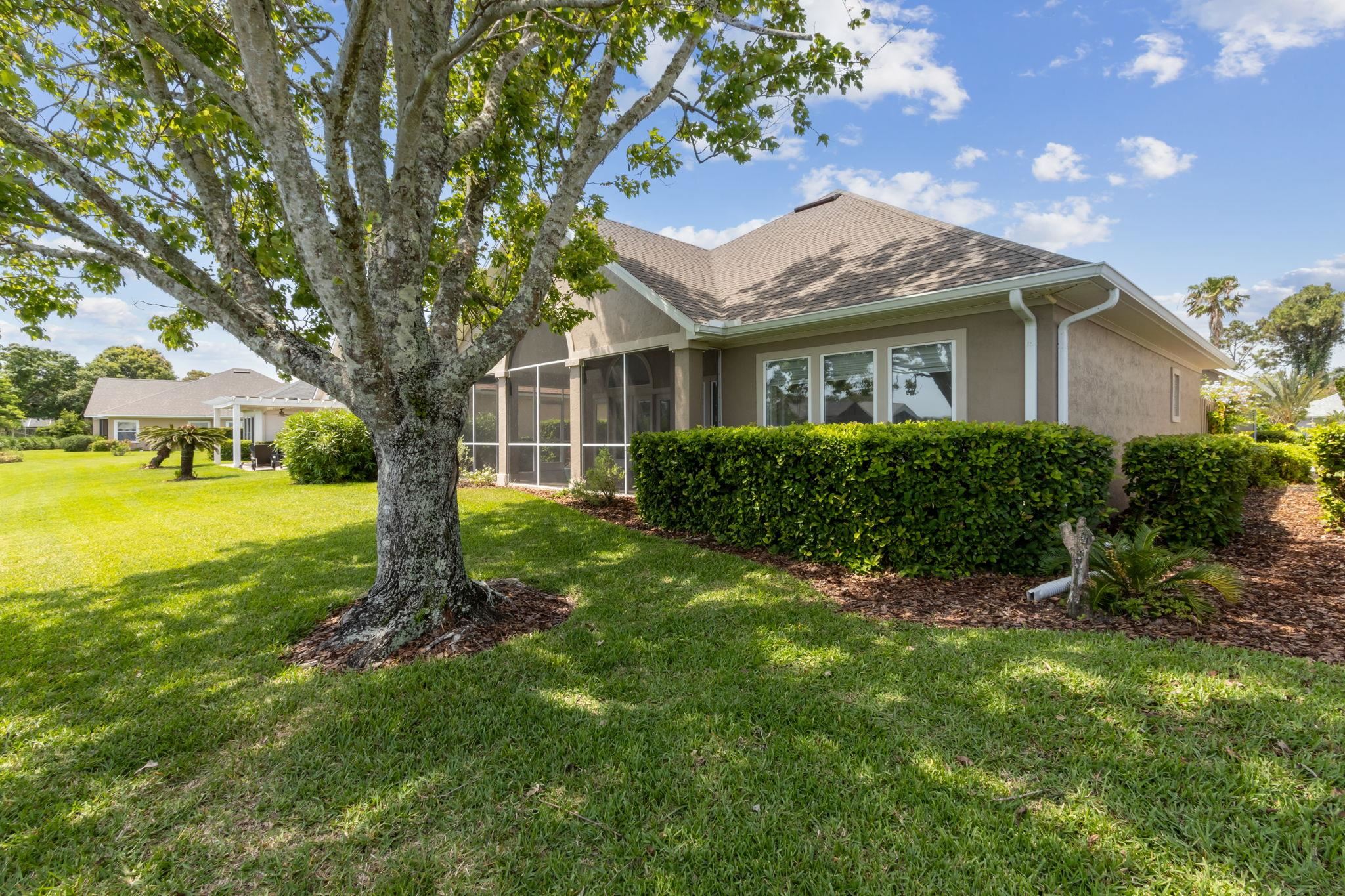 908 Birdie Way St. Augustine, FL 32080 - Photo 34 of 68 a front view of house with yard and green space