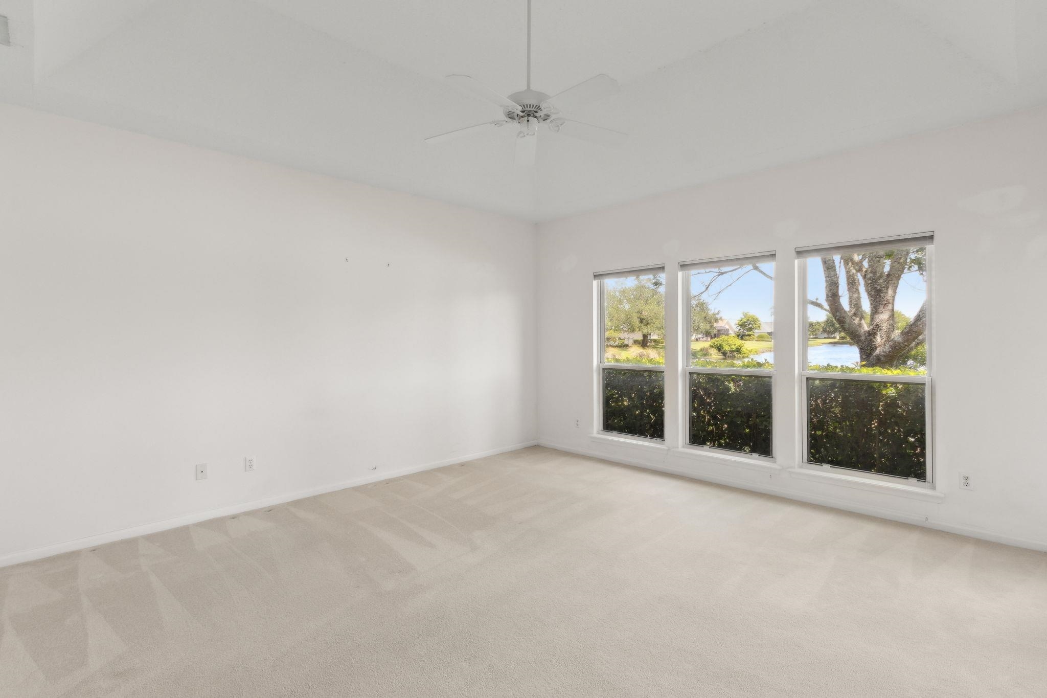 908 Birdie Way St. Augustine, FL 32080 - Photo 37 of 68 an empty room with windows