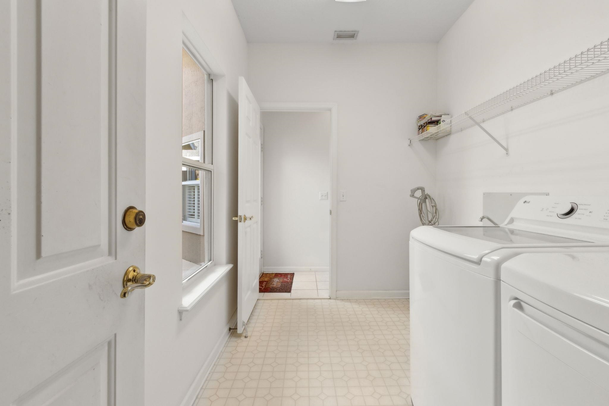 908 Birdie Way St. Augustine, FL 32080 - Photo 47 of 68 a bathroom with a sink a toilet and shower