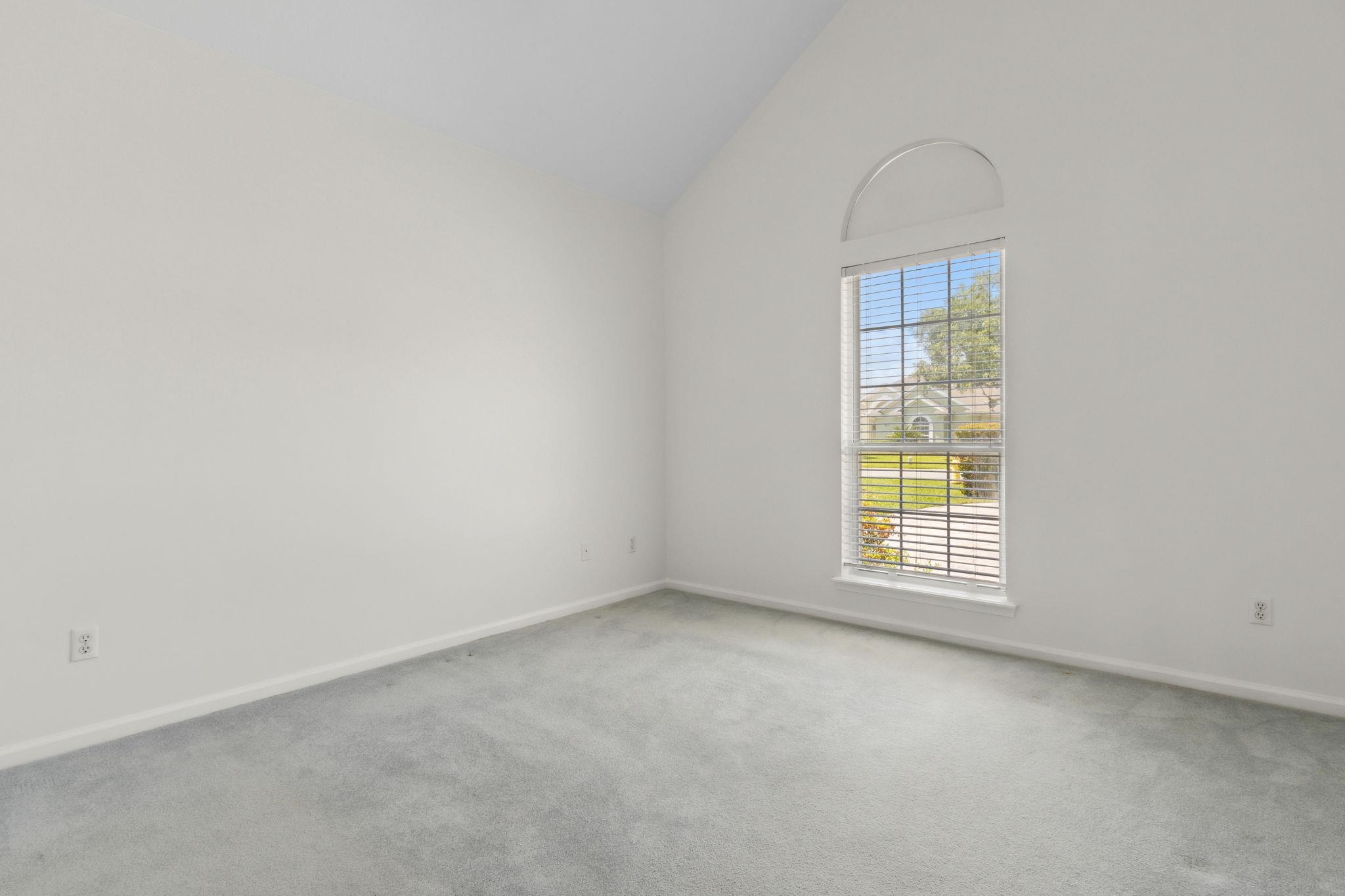 908 Birdie Way St. Augustine, FL 32080 - Photo 48 of 68 an empty room with a window