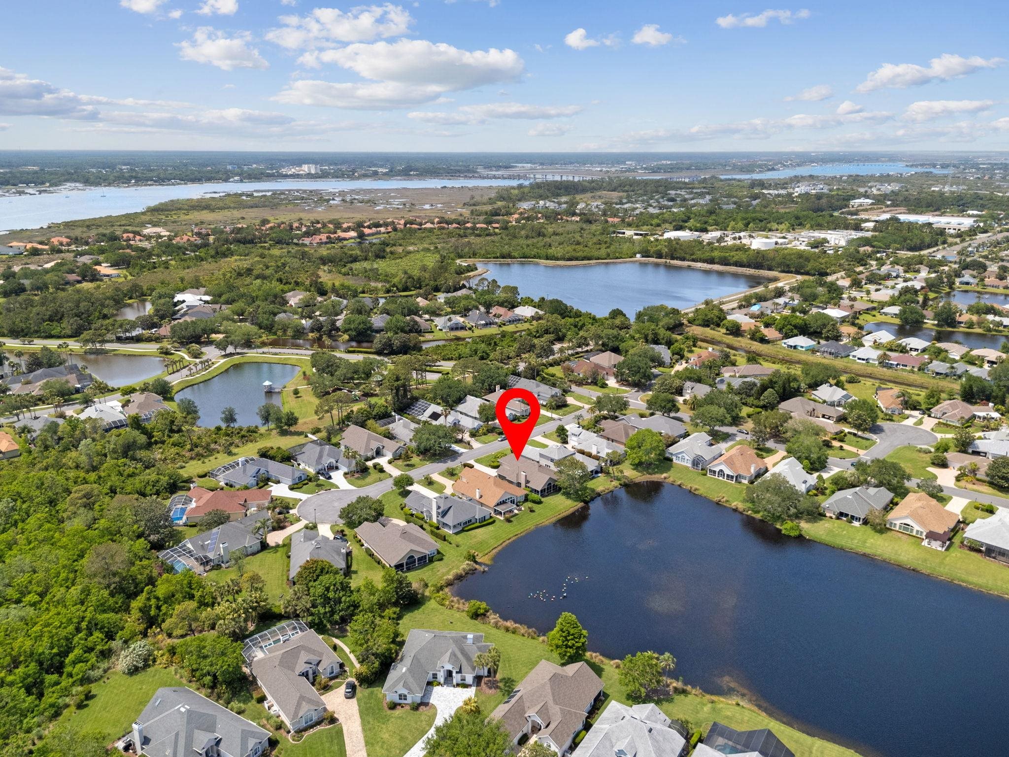 908 Birdie Way St. Augustine, FL 32080 - Photo 56 of 68 an aerial view of residential houses with outdoor space