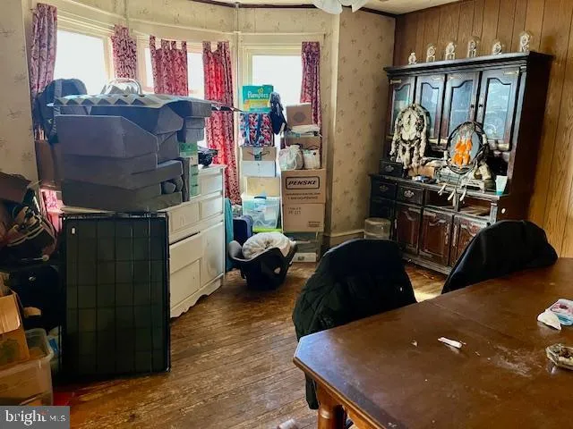 a living room filled with furniture and a couch