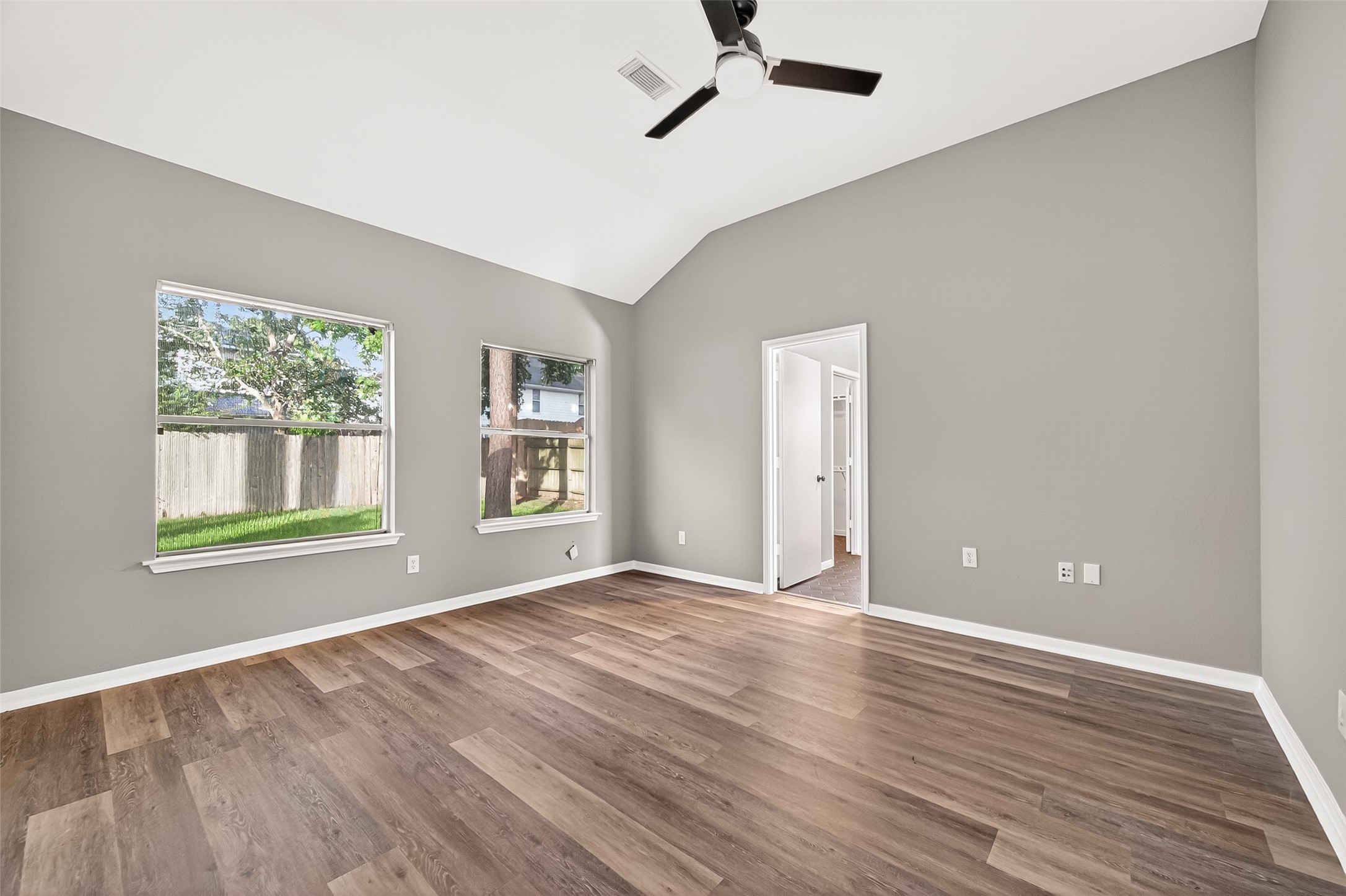 23810 Spring Way Drive Spring, TX 77373 - Photo 15 of 35 a view of an empty room with wooden floor and a window