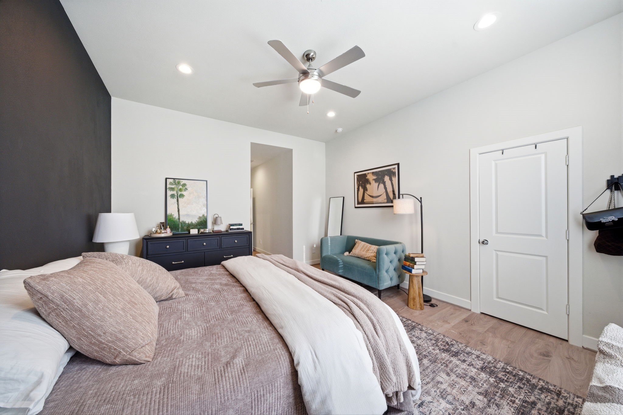 5929 Haring Lane Houston, TX 77091 - Photo 13 of 25 a bedroom with a bed and window