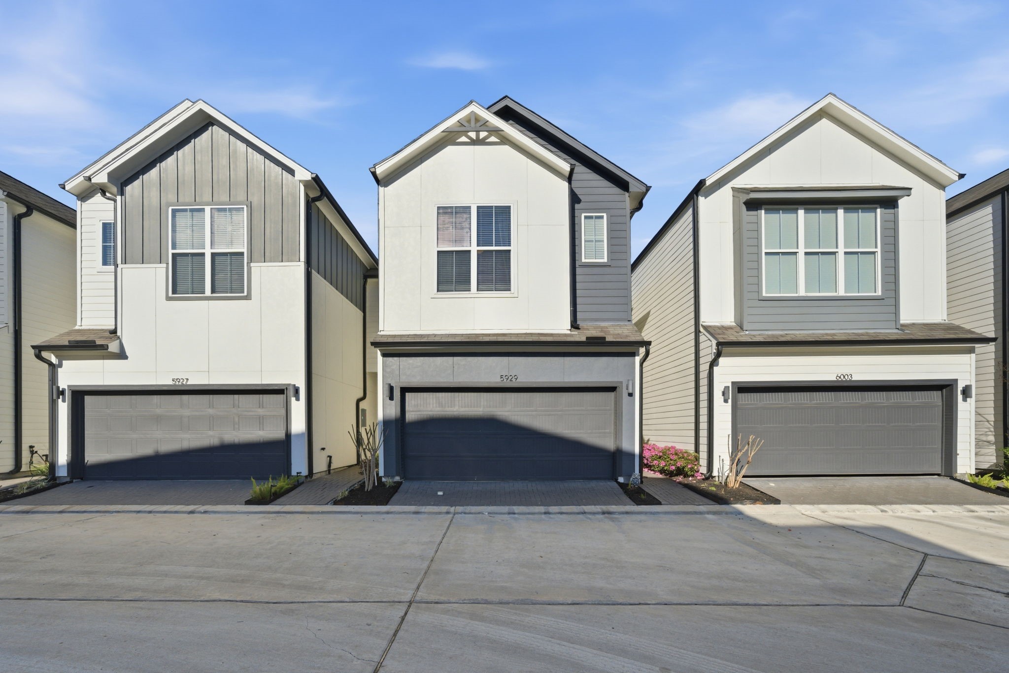 5929 Haring Lane Houston, TX 77091 - Photo 2 of 25 a front view of a house with a garage