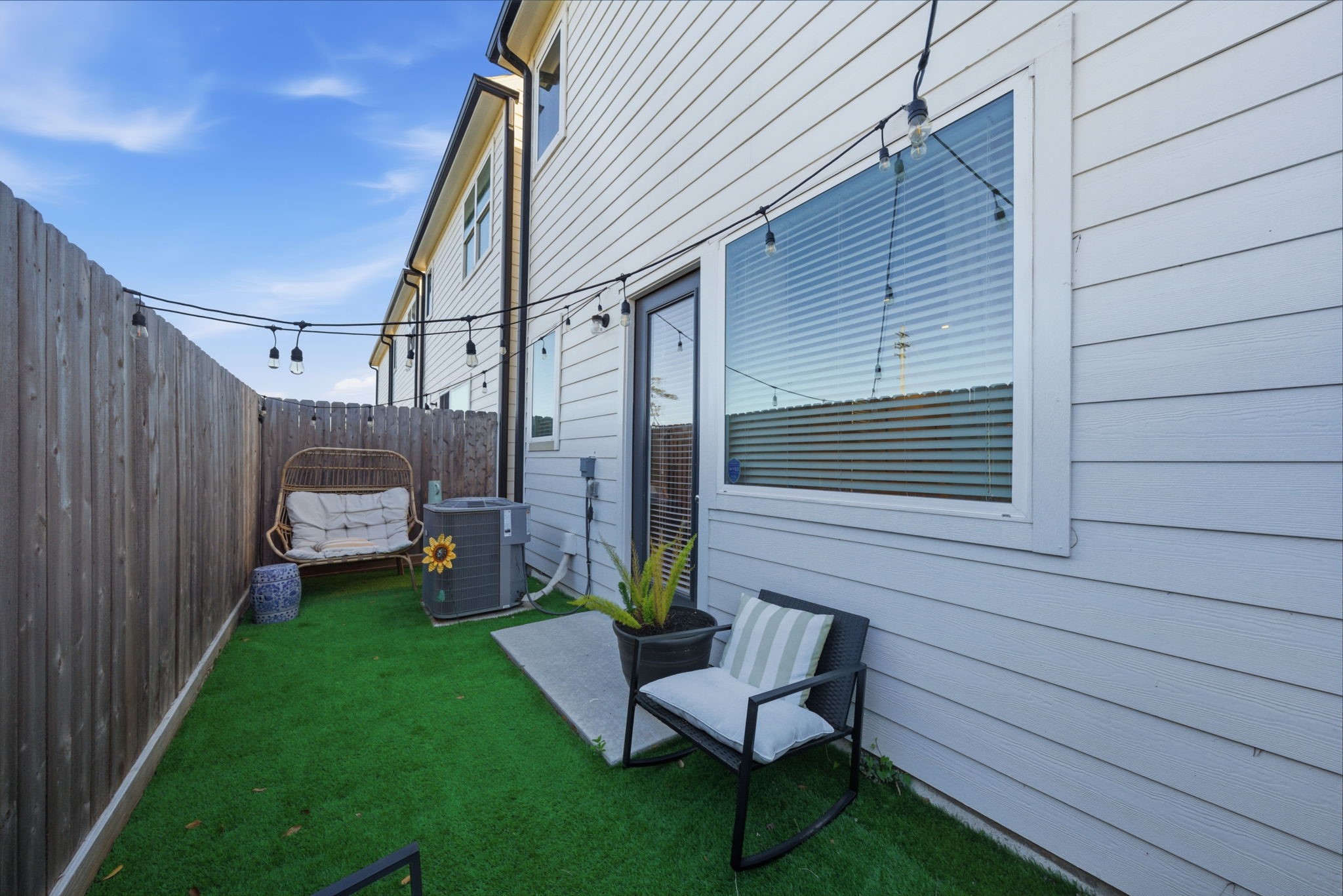 5929 Haring Lane Houston, TX 77091 - Photo 22 of 25 a view of a chair and table in backyard of the house