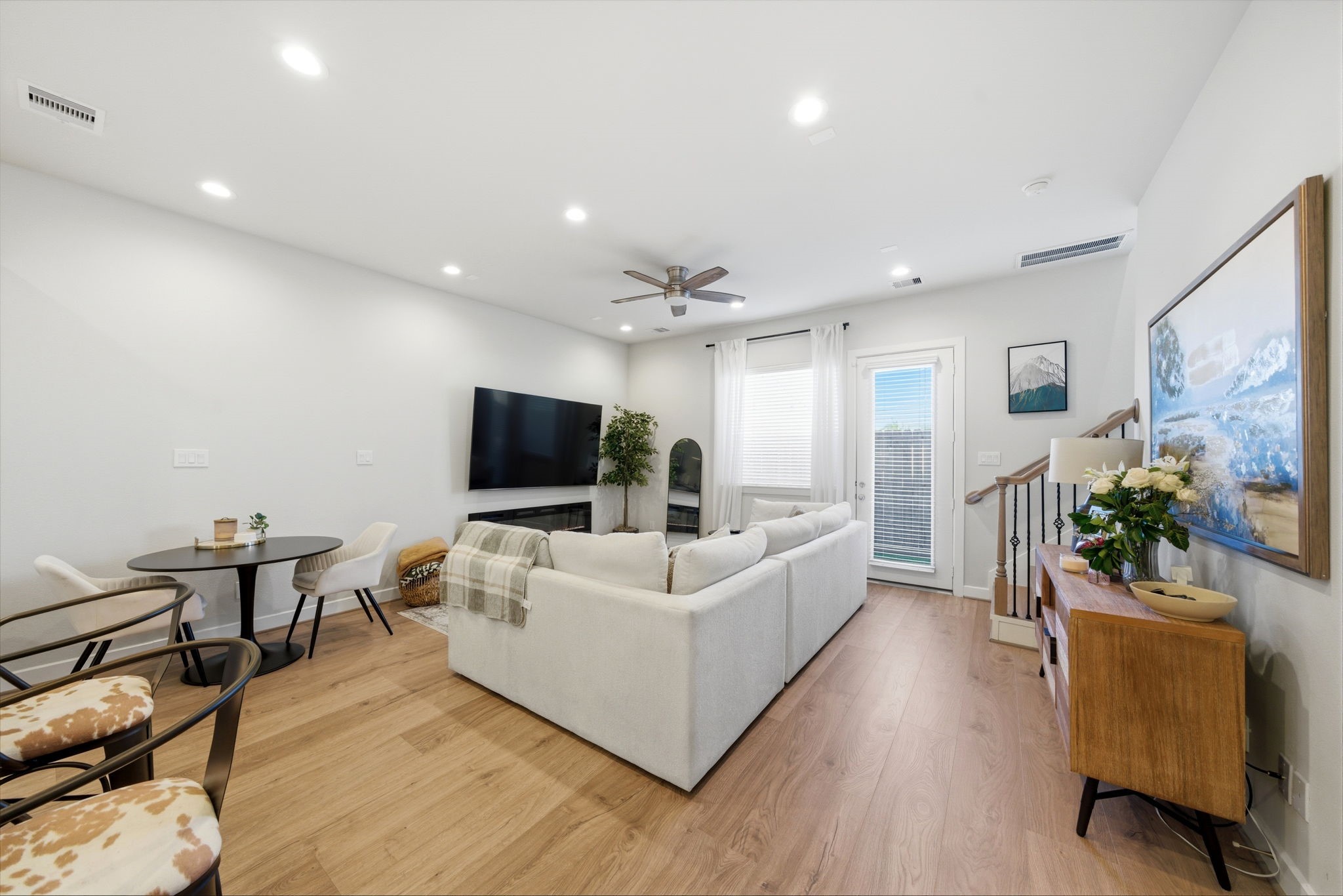 5929 Haring Lane Houston, TX 77091 - Photo 5 of 25 a living room with furniture and a flat screen tv
