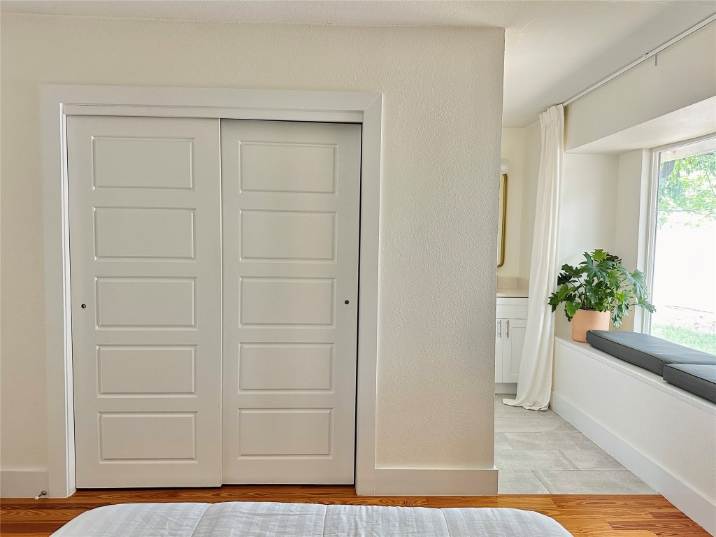 4504 West Village Court Austin, TX 78744 - Photo 15 of 18 a view of bathroom with wooden floor
