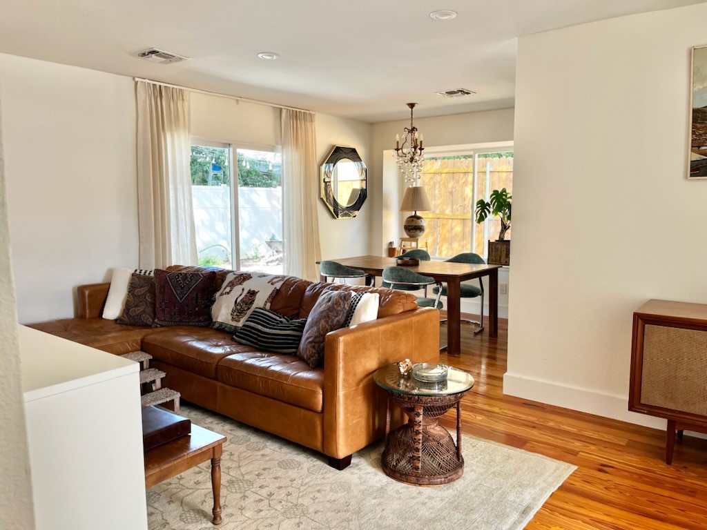 4504 West Village Court Austin, TX 78744 - Photo 4 of 18 a living room with furniture and a window