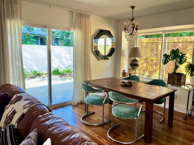 a room with furniture and a large window