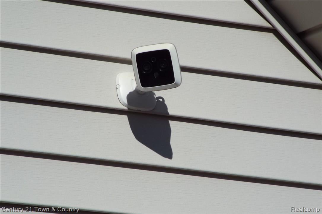 6384 Perry Road Grand Blanc, MI 48439 - Photo 66 of 77 Monitored Security system fire alarm, CO detector and cameras