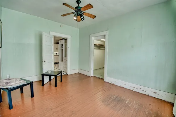 a view of room with furniture wooden floor and window