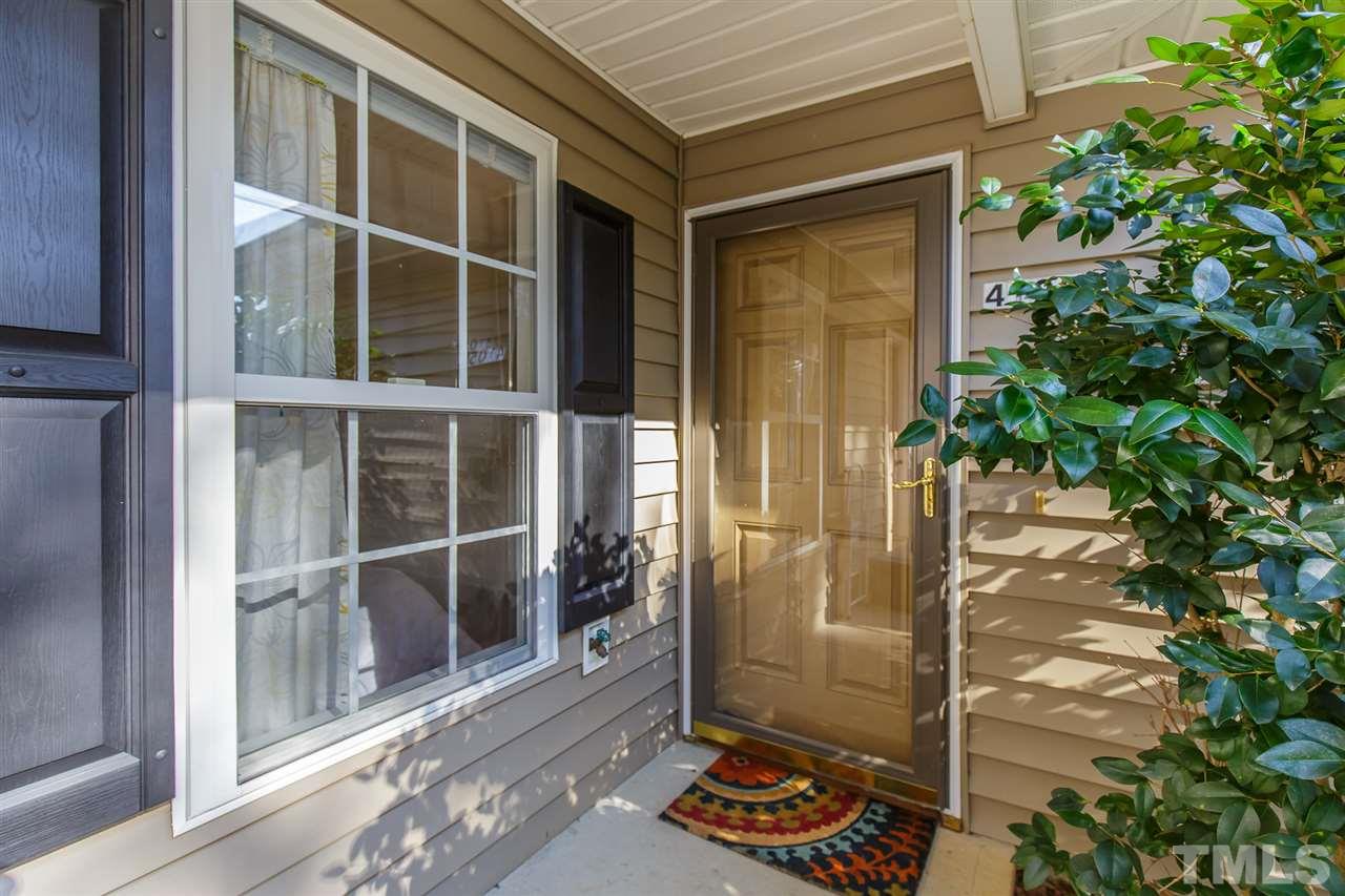 a view of a door and a window