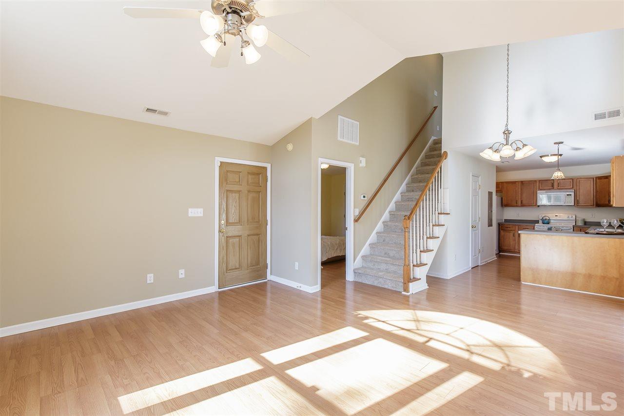 4105 Neal Road, Unit C Durham, NC 27705 - Photo 2 of 22 a view of entryway and hall with wooden floor