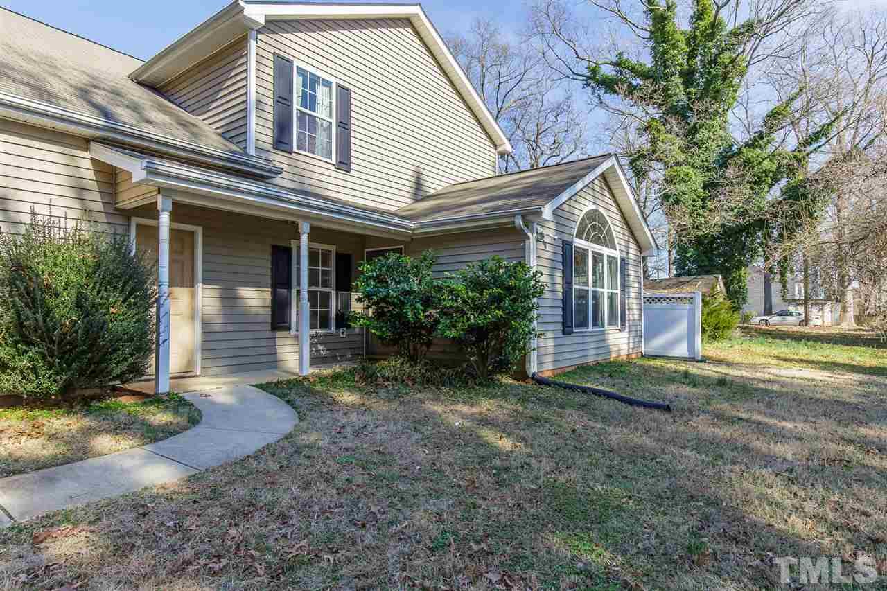 4105 Neal Road, Unit C Durham, NC 27705 - Photo 22 of 22 a view of a house with a yard