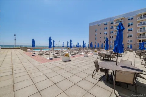 a view of a terrace with chairs