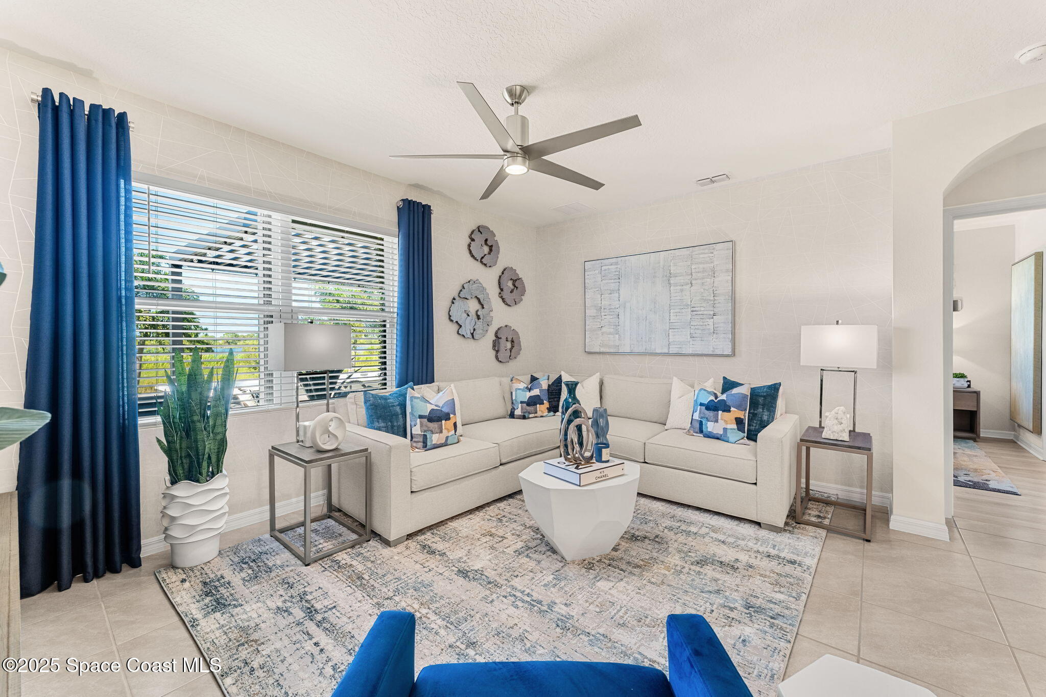 2013 Farmhouse Road Southeast Palm Bay, FL 32909 - Photo 14 of 37 a living room with furniture a rug and a large window