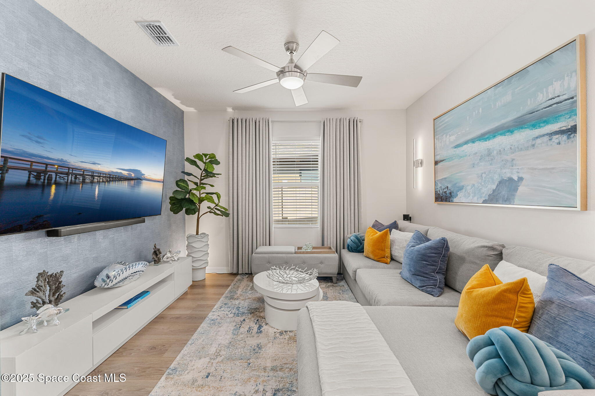 2013 Farmhouse Road Southeast Palm Bay, FL 32909 - Photo 16 of 37 a living room with furniture and a large window