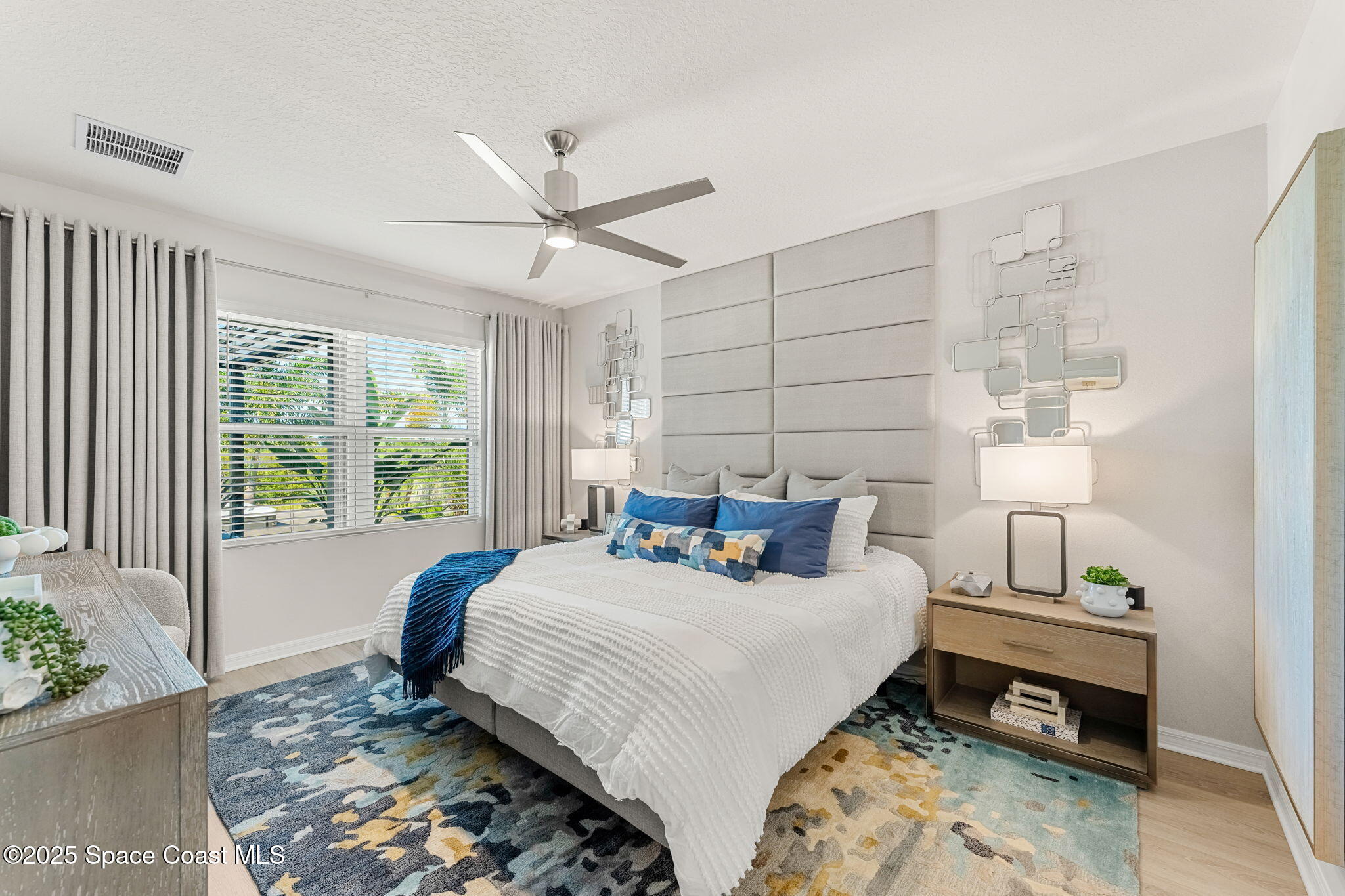 2013 Farmhouse Road Southeast Palm Bay, FL 32909 - Photo 17 of 37 a bedroom with a bed and a window