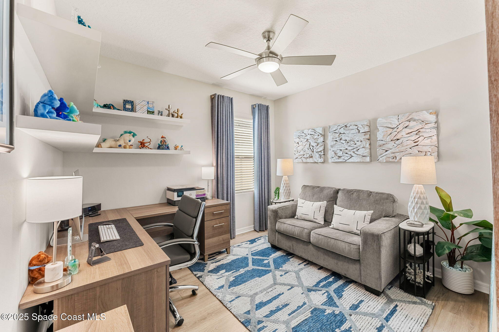 2013 Farmhouse Road Southeast Palm Bay, FL 32909 - Photo 22 of 37 a living room with furniture and decor
