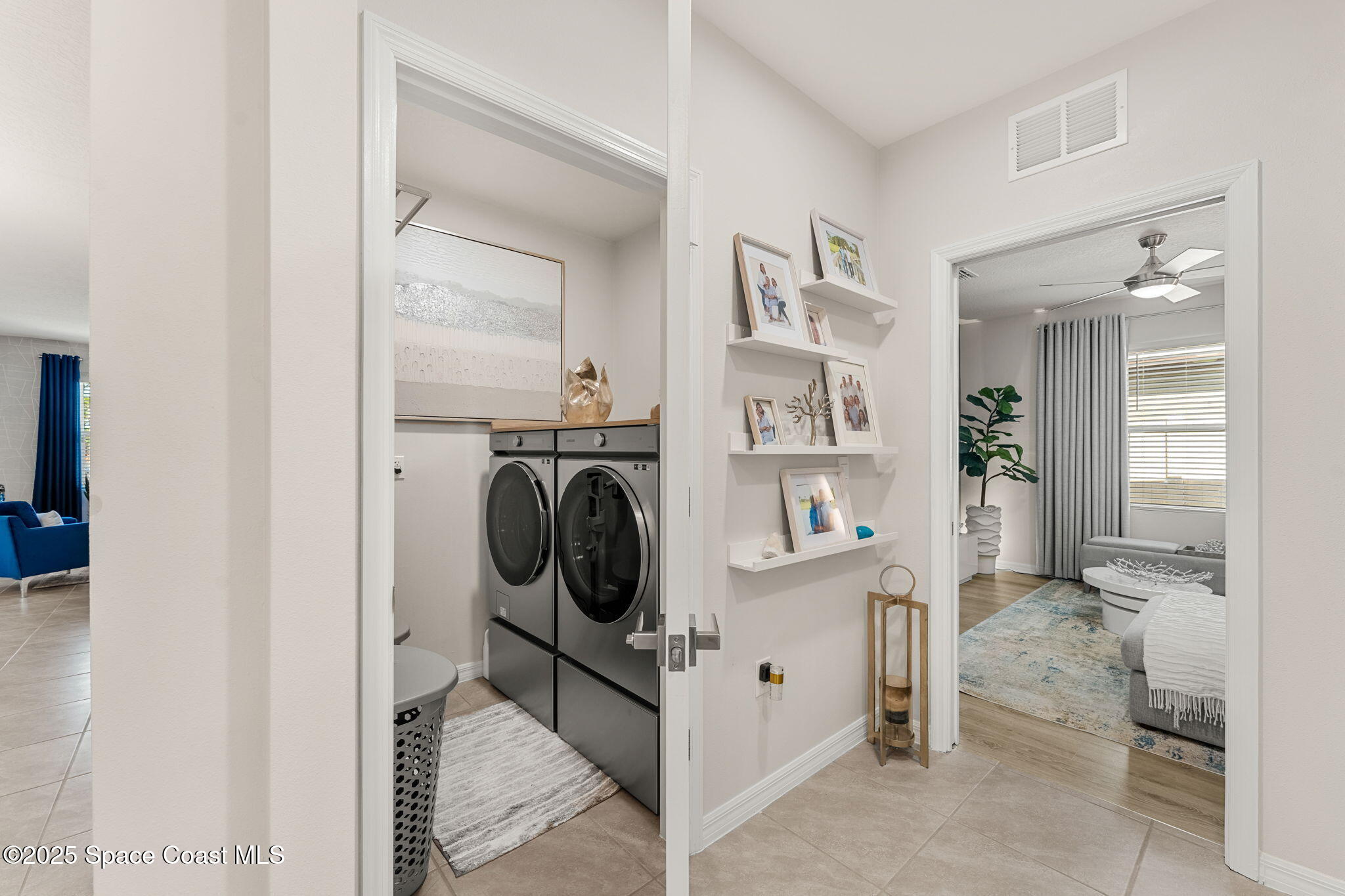 2013 Farmhouse Road Southeast Palm Bay, FL 32909 - Photo 23 of 37 a view of living room washer and dryer