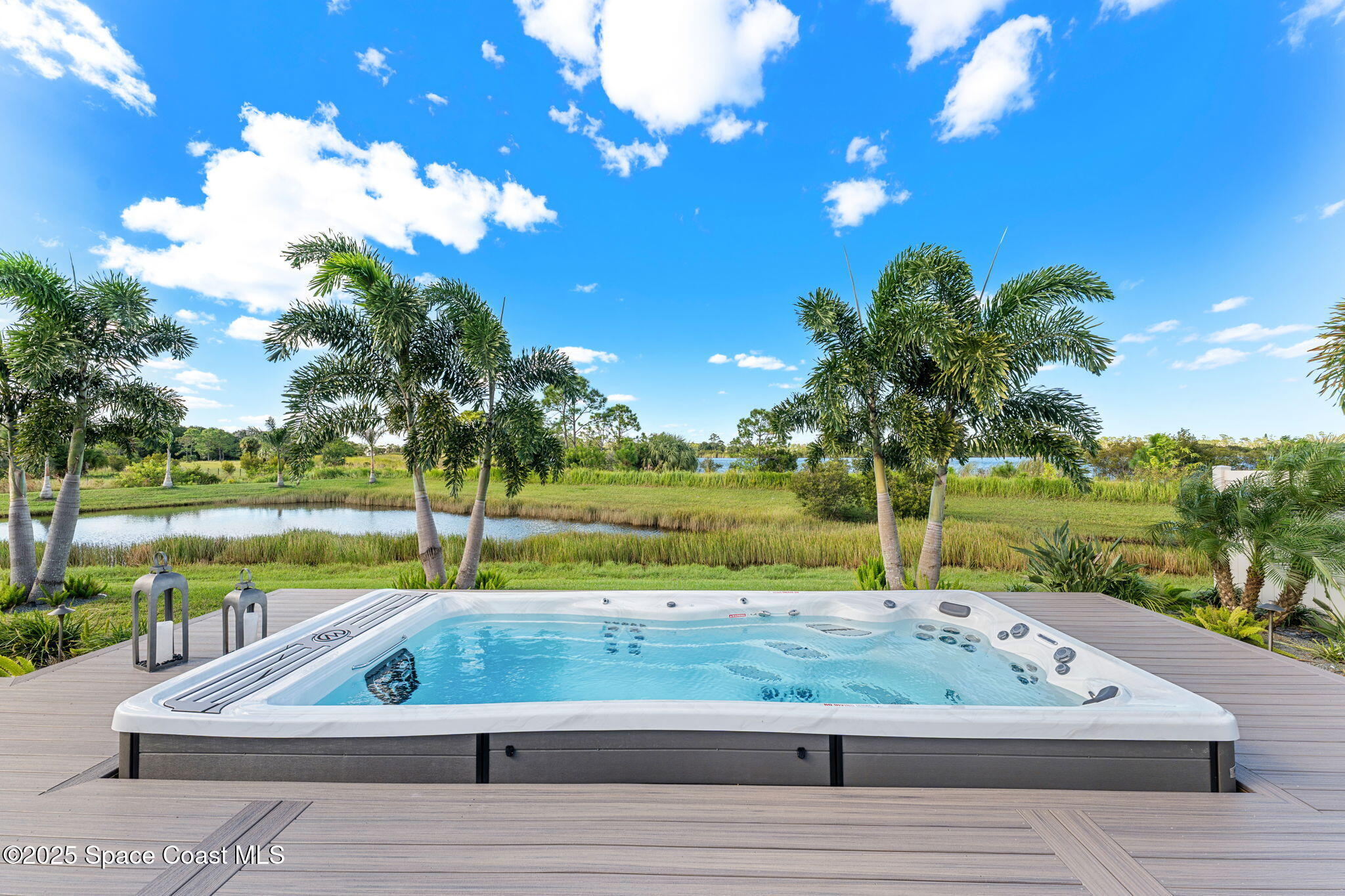 2013 Farmhouse Road Southeast Palm Bay, FL 32909 - Photo 26 of 37 a view of a swimming pool with a yard