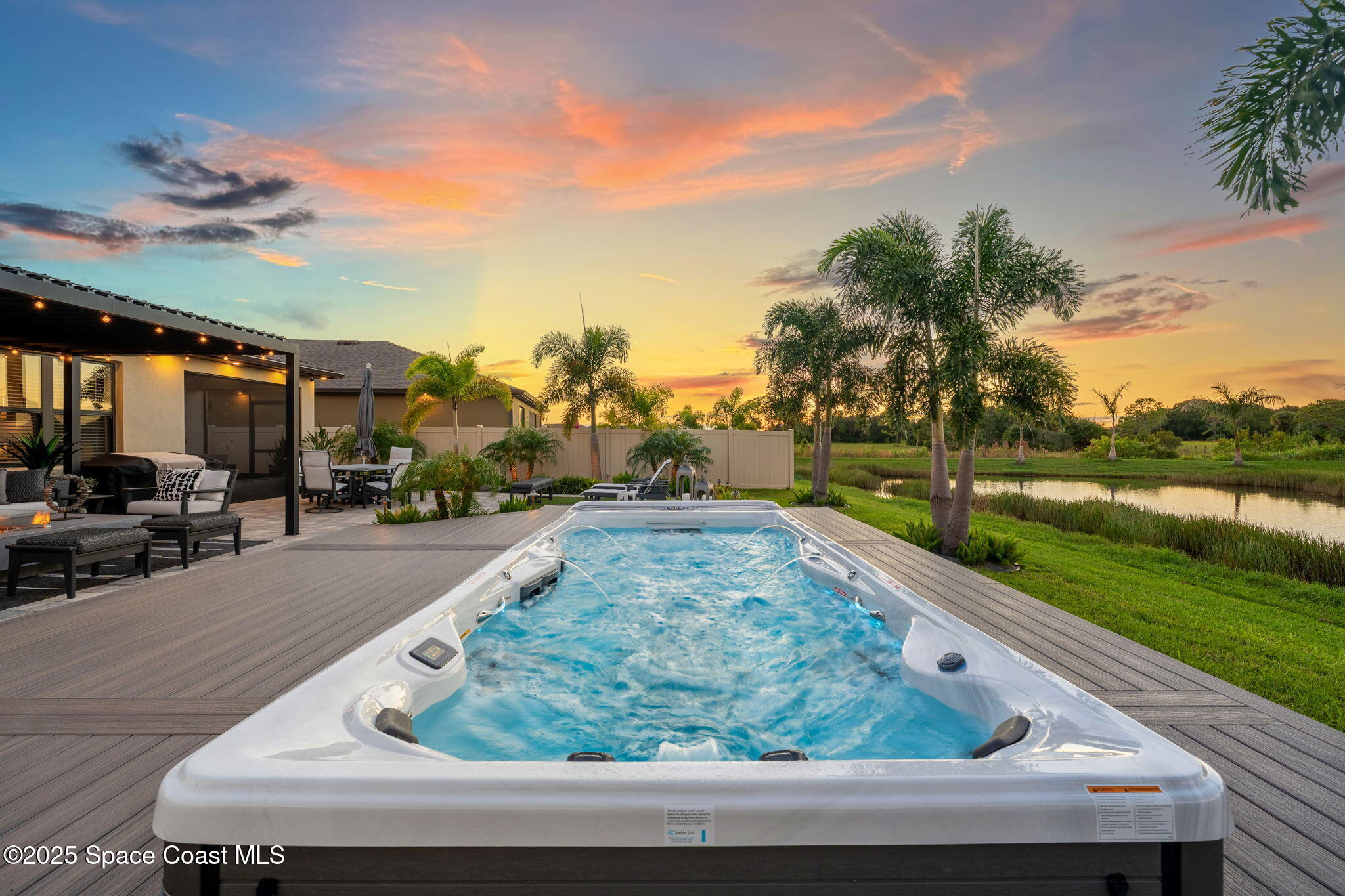 2013 Farmhouse Road Southeast Palm Bay, FL 32909 - Photo 28 of 37 a view of swimming pool from a balcony
