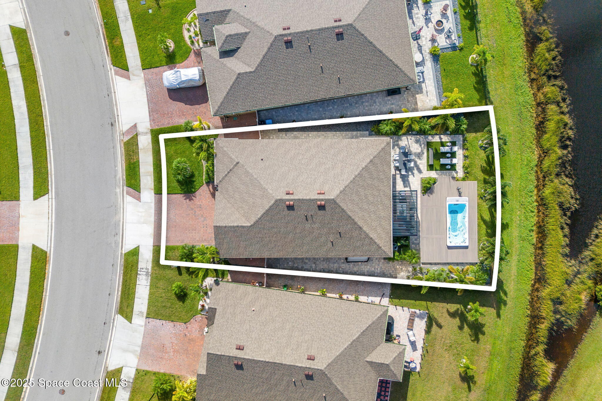 2013 Farmhouse Road Southeast Palm Bay, FL 32909 - Photo 32 of 37 an aerial view of balcony and yard