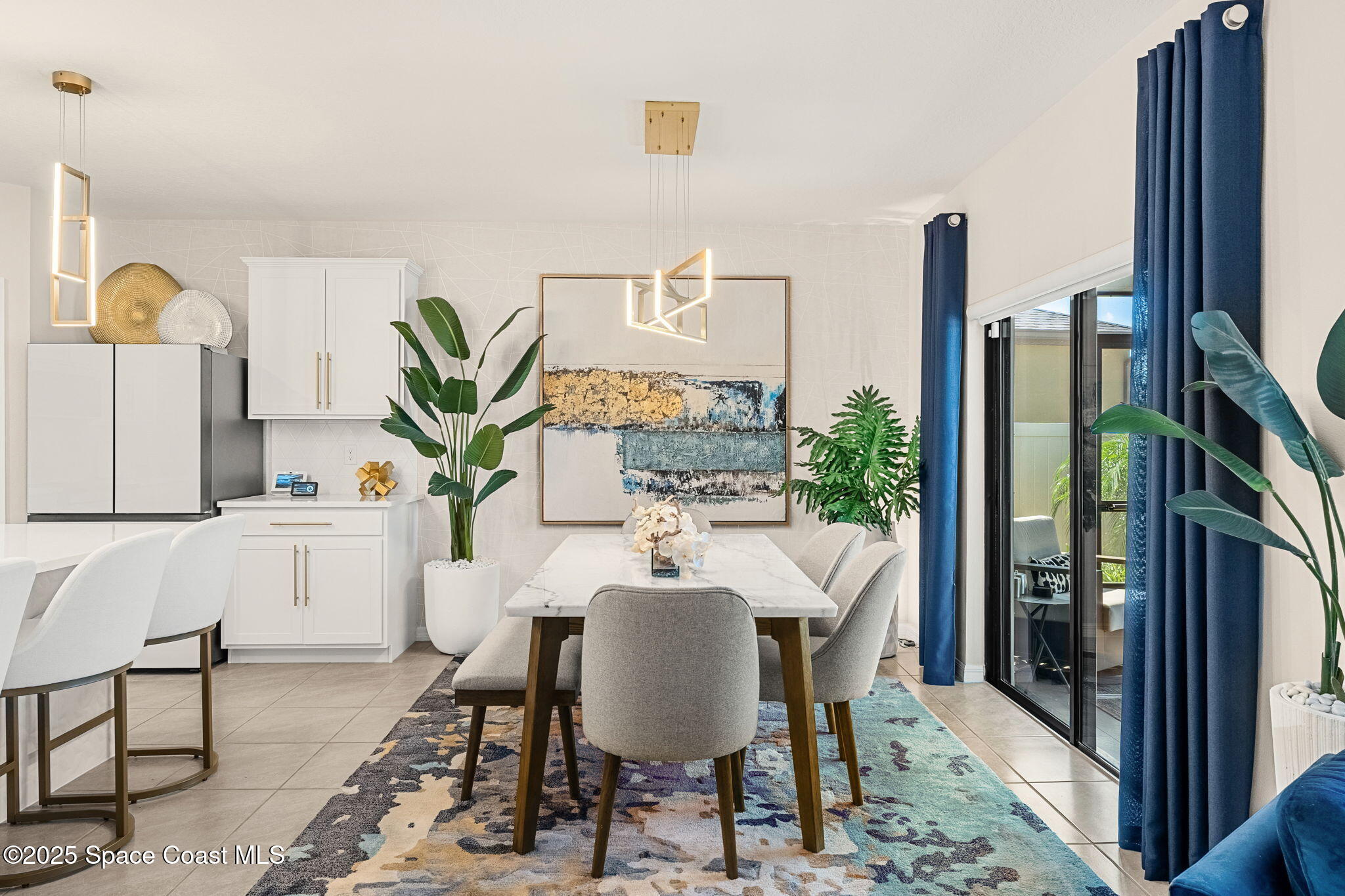 2013 Farmhouse Road Southeast Palm Bay, FL 32909 - Photo 7 of 37 a view of a dining room with furniture window and wooden floor
