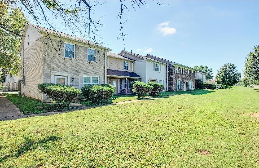a house view with a garden space