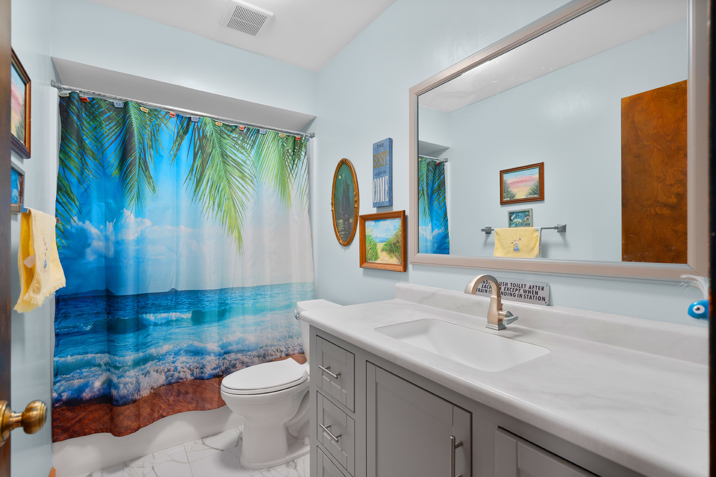 46 Feece Drive Batavia, IL 60510 - Photo 15 of 37 a bathroom with a toilet sink and mirror