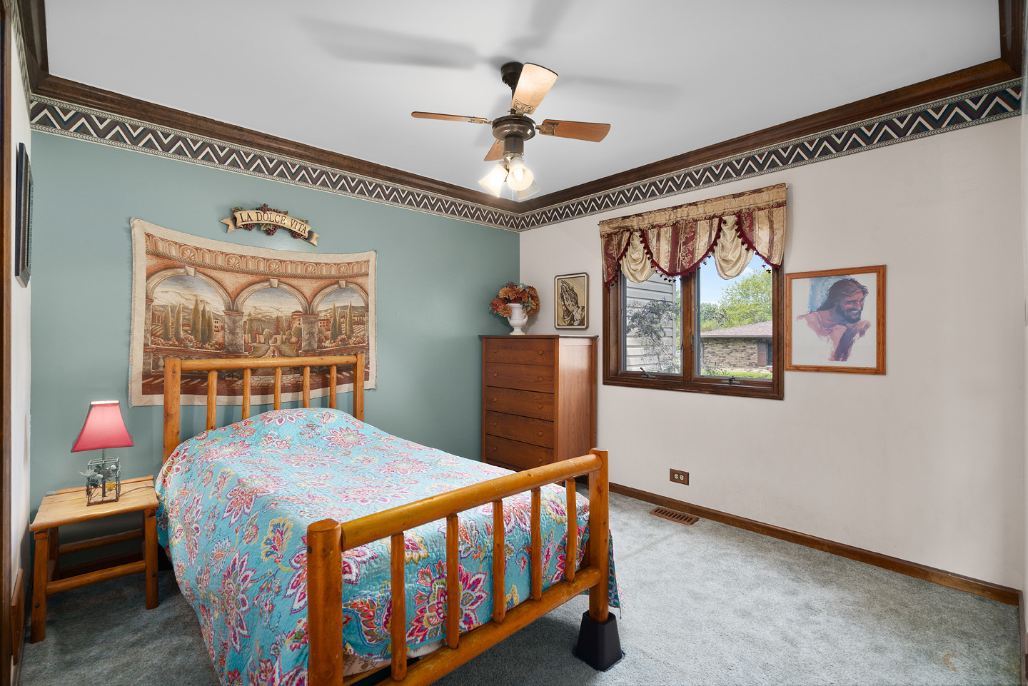 46 Feece Drive Batavia, IL 60510 - Photo 17 of 37 a bedroom with a bed a window and a chandelier