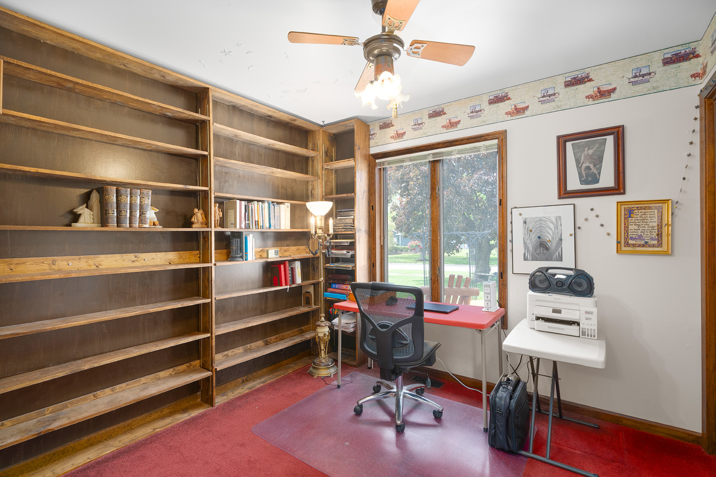 46 Feece Drive Batavia, IL 60510 - Photo 18 of 37 a view of a workspace with furniture and a window