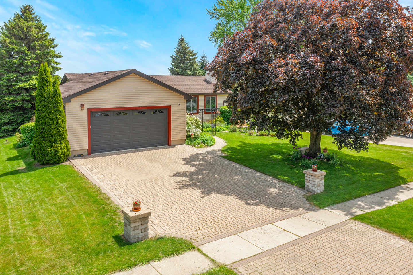 46 Feece Drive Batavia, IL 60510 - Photo 2 of 37 a front view of a house with a yard and trees