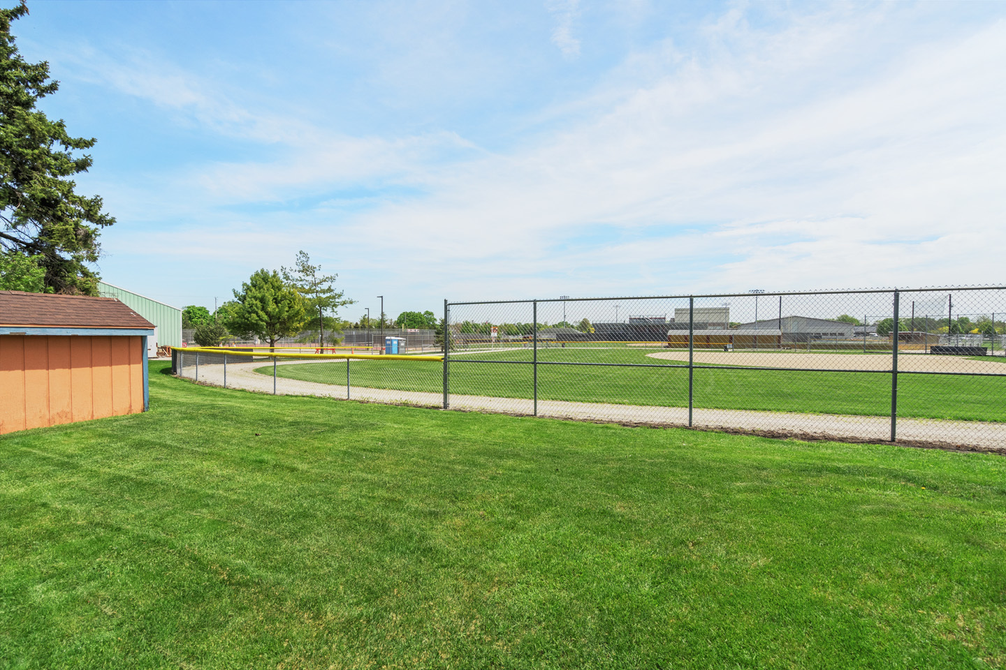 46 Feece Drive Batavia, IL 60510 - Photo 29 of 37 a view of a golf course with a lake