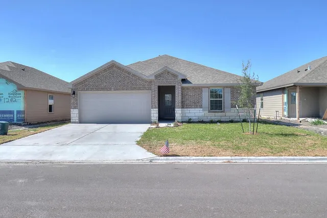 a front view of house with yard