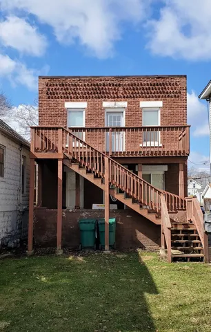 a view of a house with roof deck