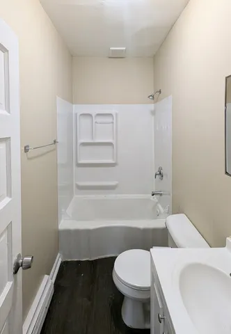 a bathroom with a sink toilet and bathtub
