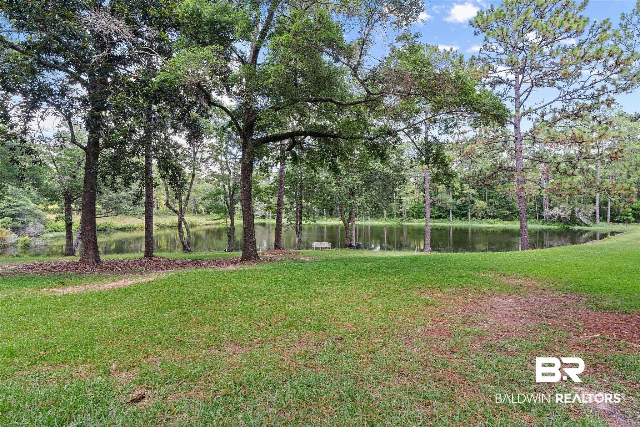 8561 Dawes Lake Road Mobile, AL 36619 - Photo 46 of 63 View of grassy yard featuring a water view