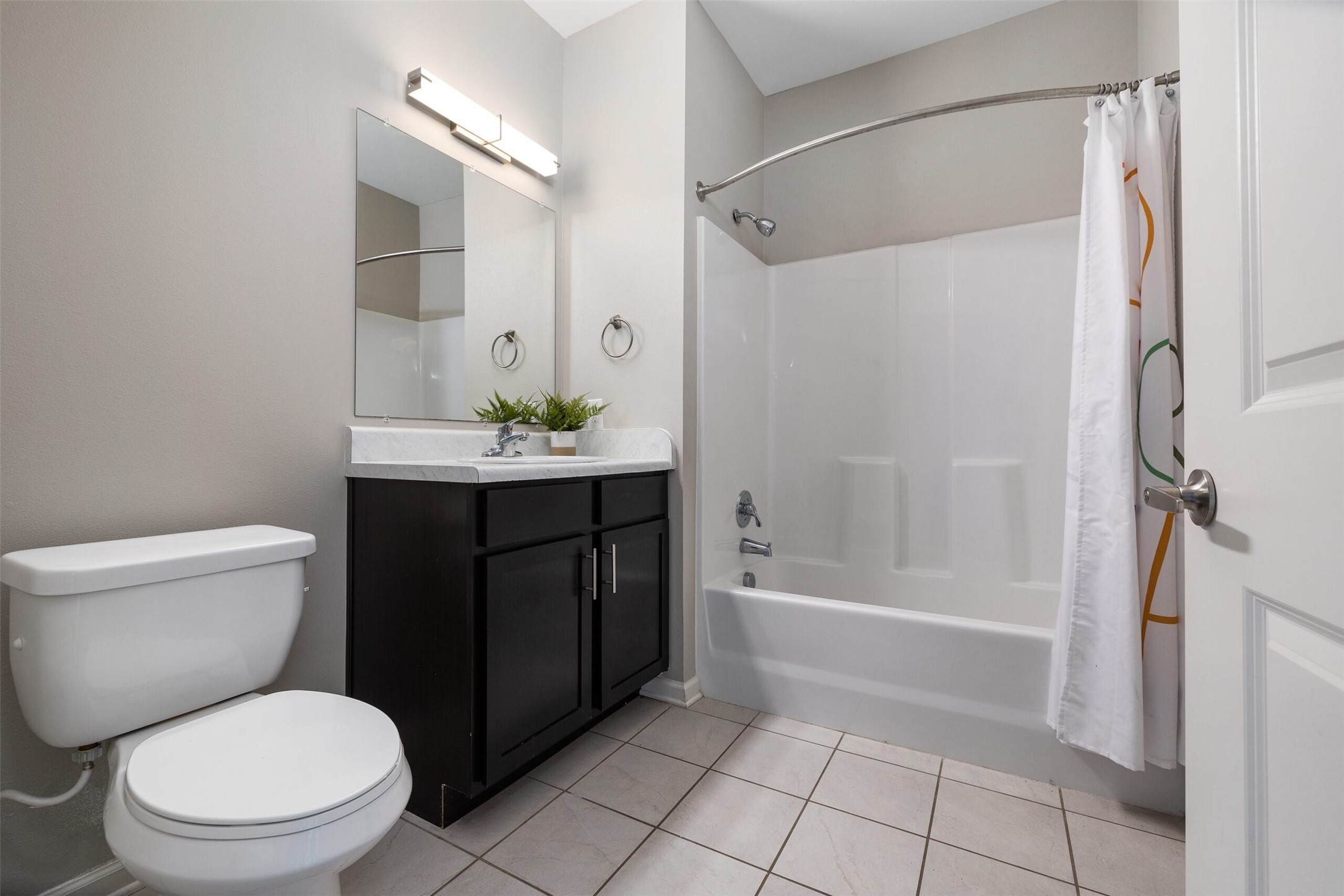 4101 5th Avenue Lake Charles, LA 70607 - Photo 5 of 16 a bathroom with a sink a toilet and shower