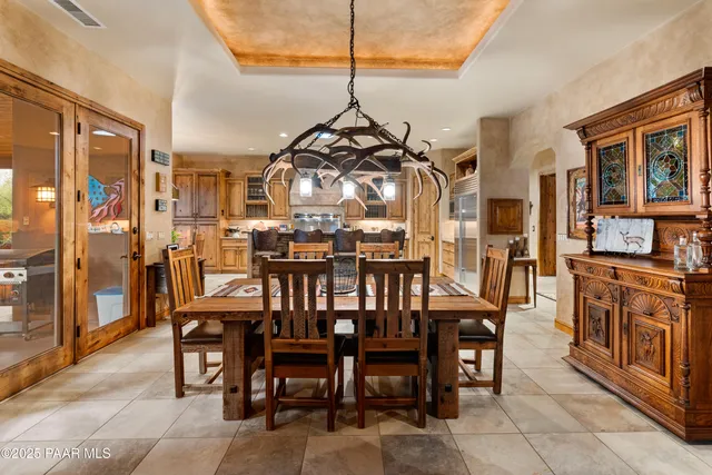 a stove top oven sitting inside of a kitchen
