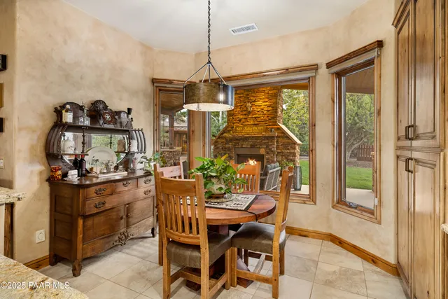 a view of a bathroom with dual sinks