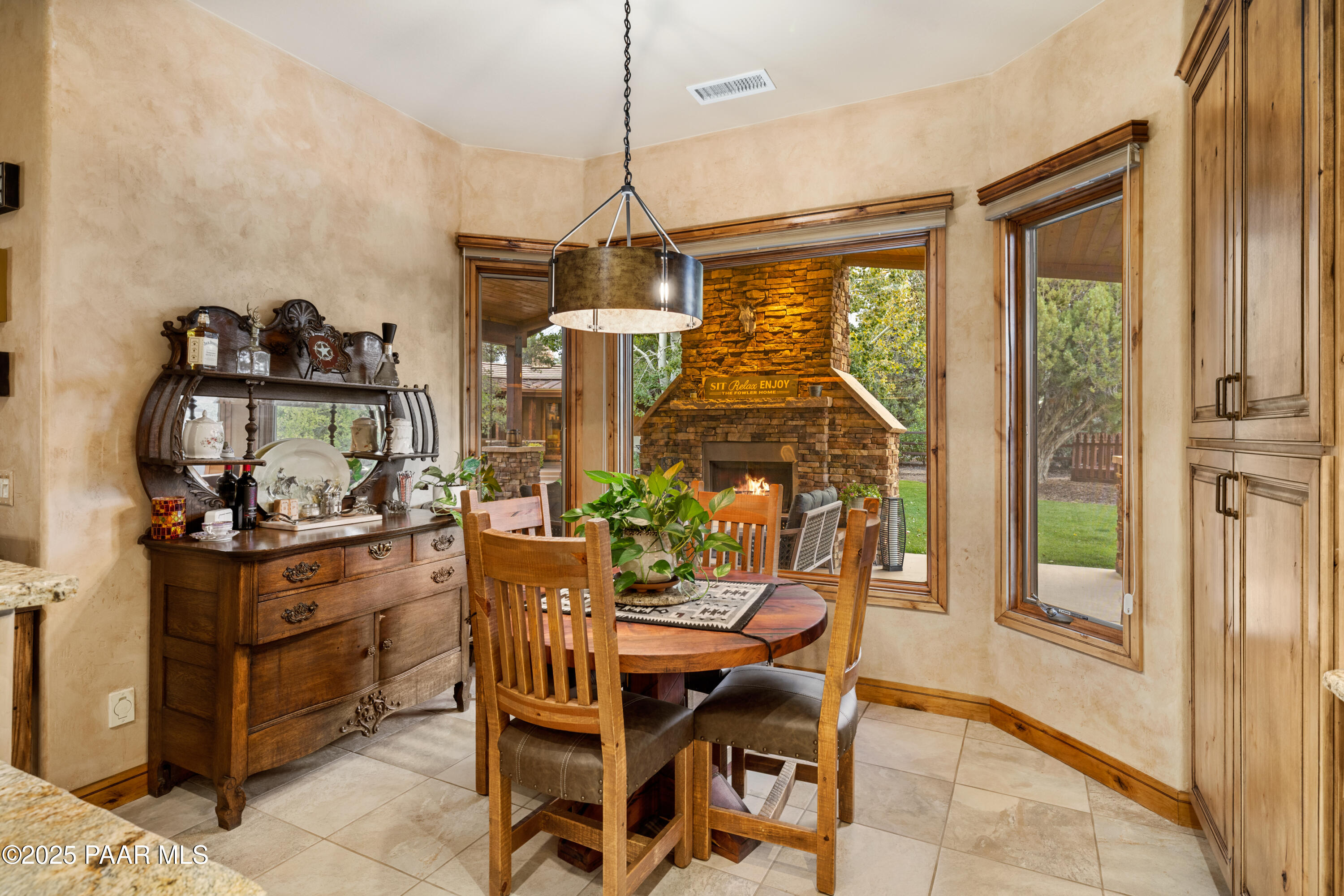 5110 Indian Camp Road Prescott, AZ 86305 - Photo 18 of 79 a dining room with furniture window wooden floor