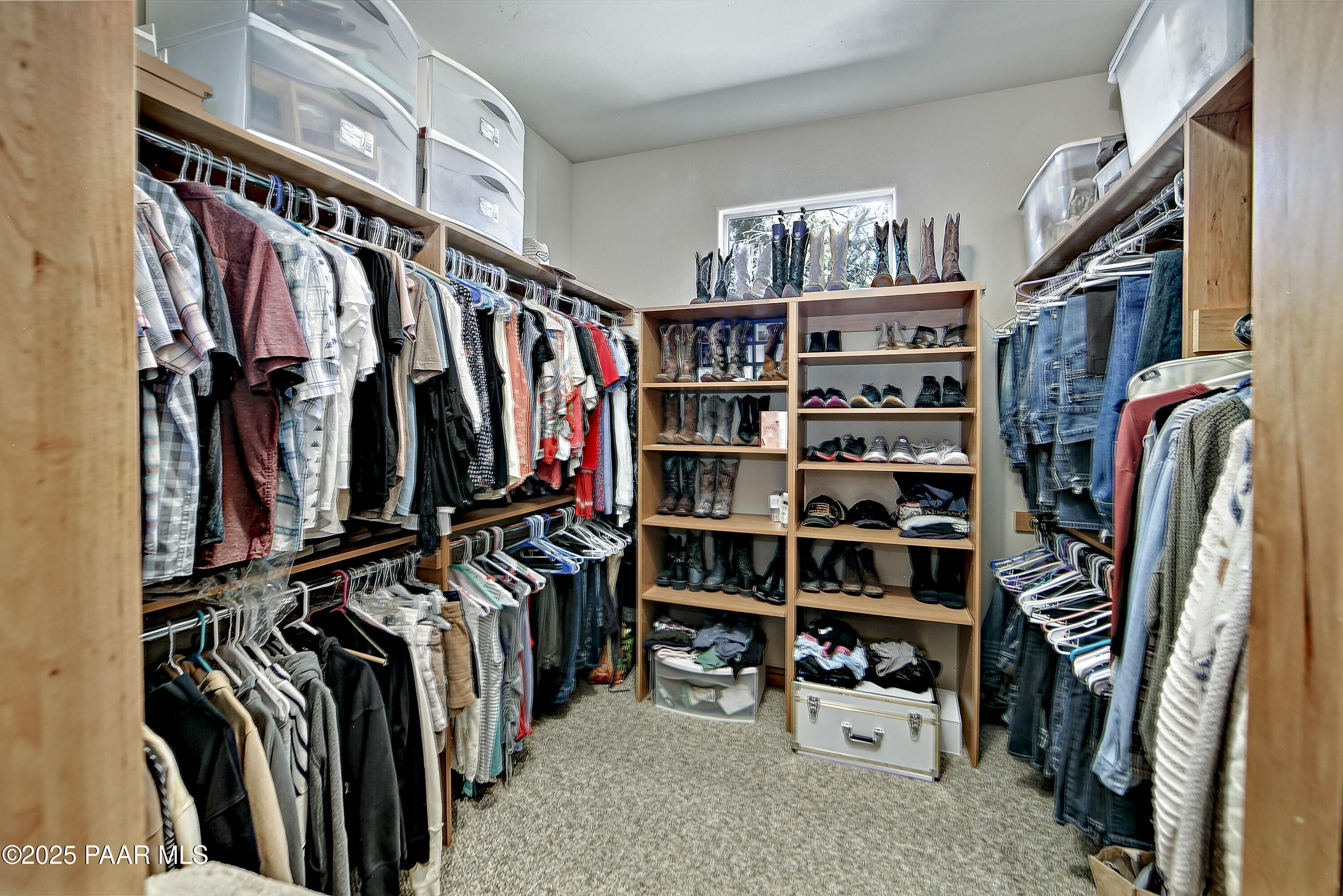 5110 Indian Camp Road Prescott, AZ 86305 - Photo 29 of 79 a view of walk in closet with clothes and shoes