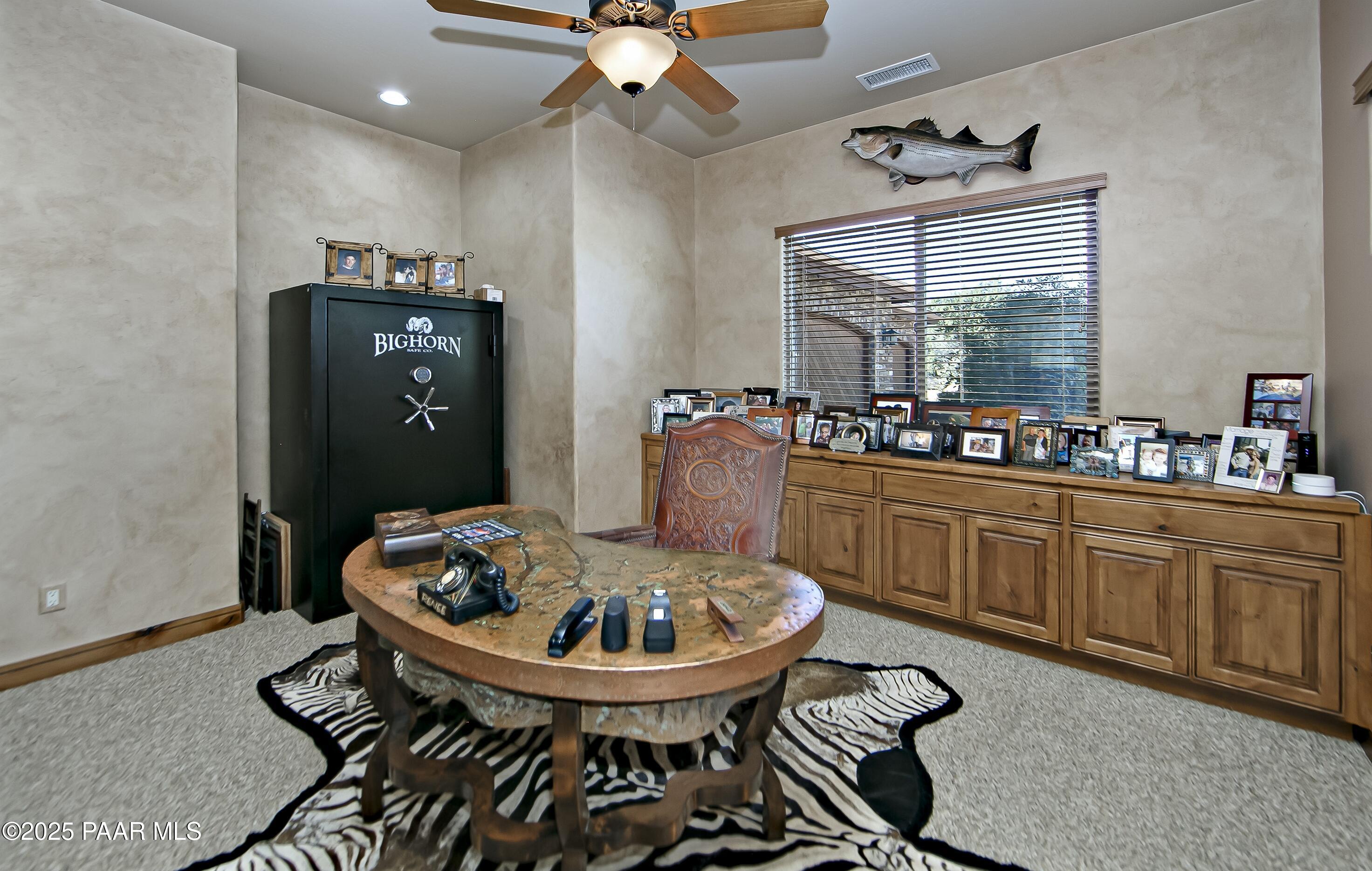 5110 Indian Camp Road Prescott, AZ 86305 - Photo 32 of 79 a room with granite countertop furniture and a window