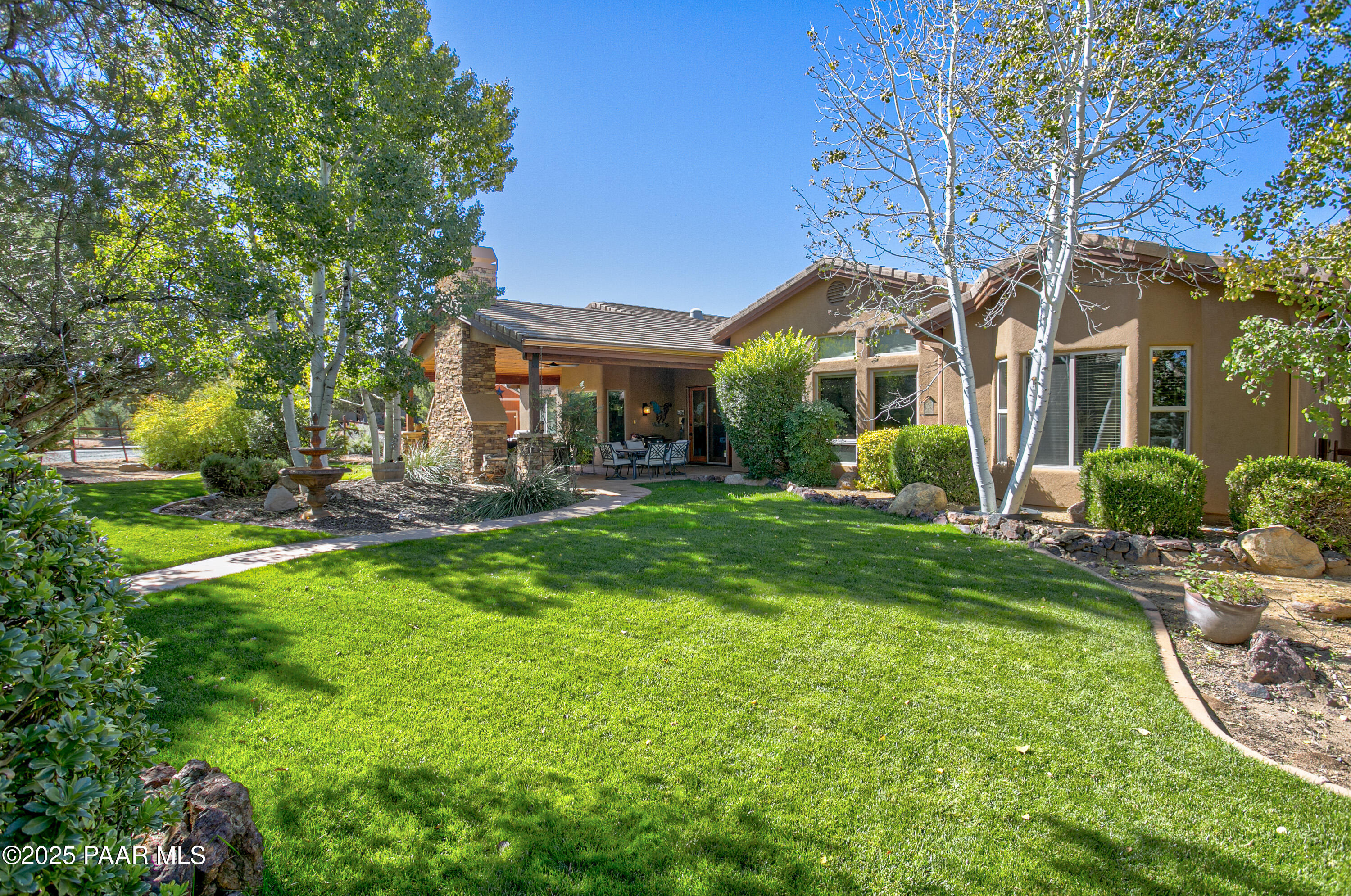 5110 Indian Camp Road Prescott, AZ 86305 - Photo 50 of 79 a front view of a house with garden